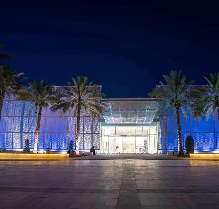 Manarat Al Saadiyat cultural centre at night near Sei Saadiyat 2 by Aldar on Saadiyat Island, Abu Dhabi — reference institutional imagery